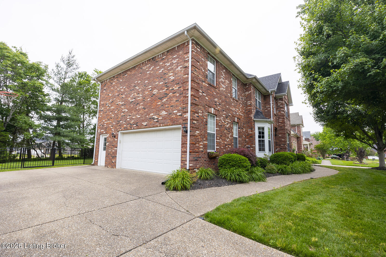 14024 Spring Mill Road Louisville, KY 40245 - Photo 2 of 50 Large two-car garage with man door