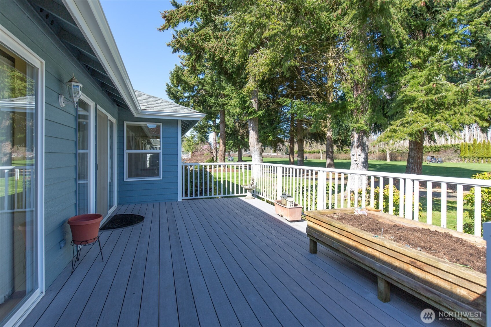 170 Hurricane Ridge Drive Sequim, WA 98382 - Photo 8 of 39 a view of balcony with wooden floor and fence