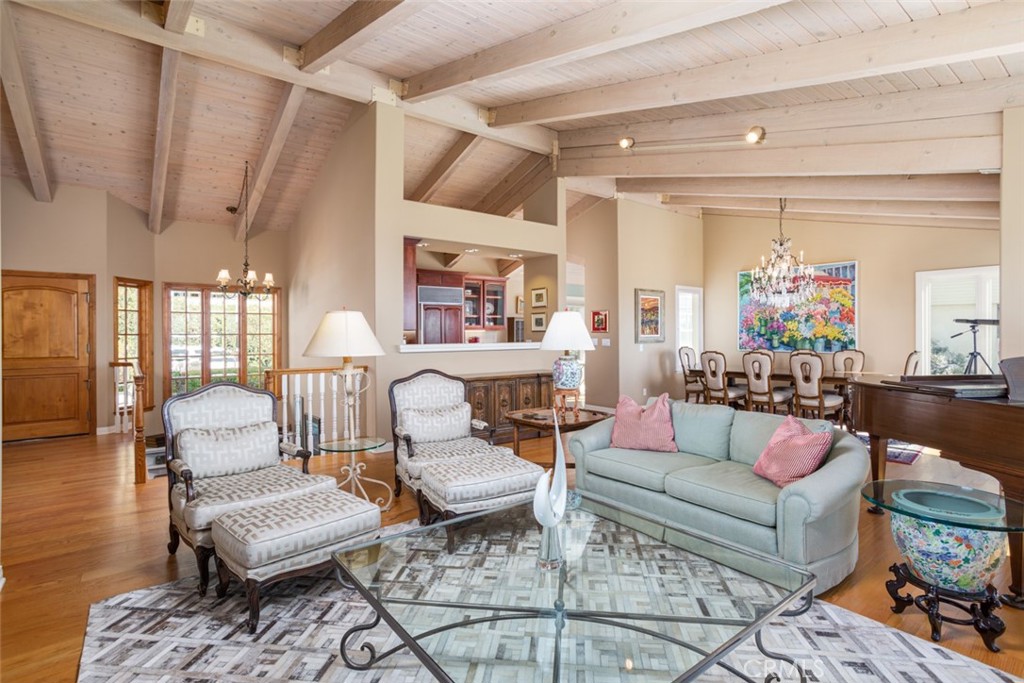 521 Emerald Bay Laguna Beach, CA 92651 - Photo 18 of 42 a living room with furniture and a chandelier