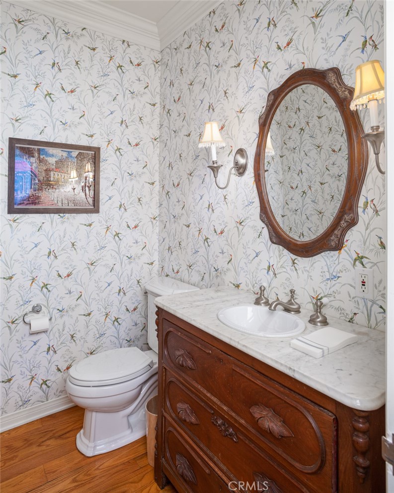 521 Emerald Bay Laguna Beach, CA 92651 - Photo 23 of 42 a bathroom with a toilet and a sink