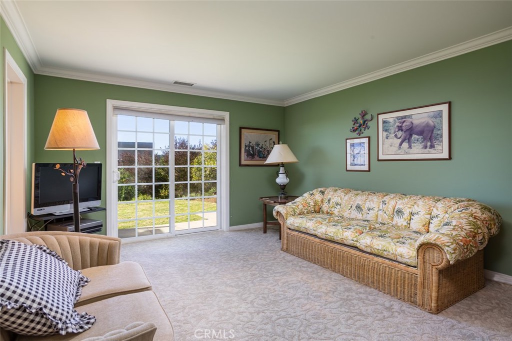 521 Emerald Bay Laguna Beach, CA 92651 - Photo 30 of 42 a bed sitting in a bedroom next to a window