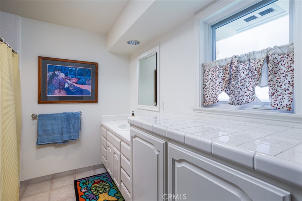 521 Emerald Bay Laguna Beach, CA 92651 - Photo 31 of 42 a hallway with a large window