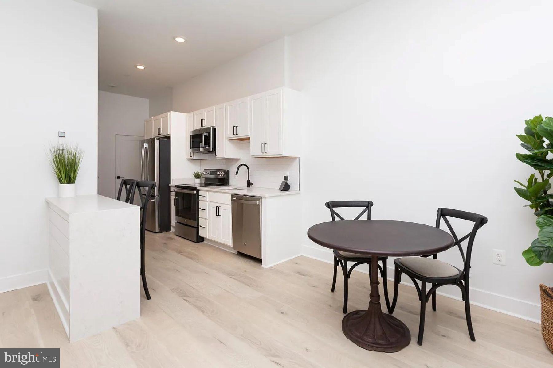 1709 Fleet Street, Unit 102 Baltimore, MD 21231 - Photo 2 of 13 Kitchen & Dining Area - Model Home