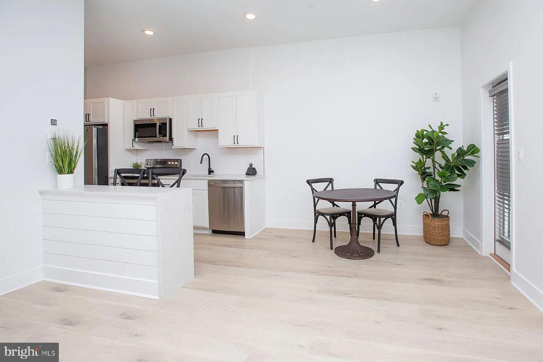 1709 Fleet Street, Unit 102 Baltimore, MD 21231 - Photo 3 of 13 Kitchen & Dining Area - Model Home