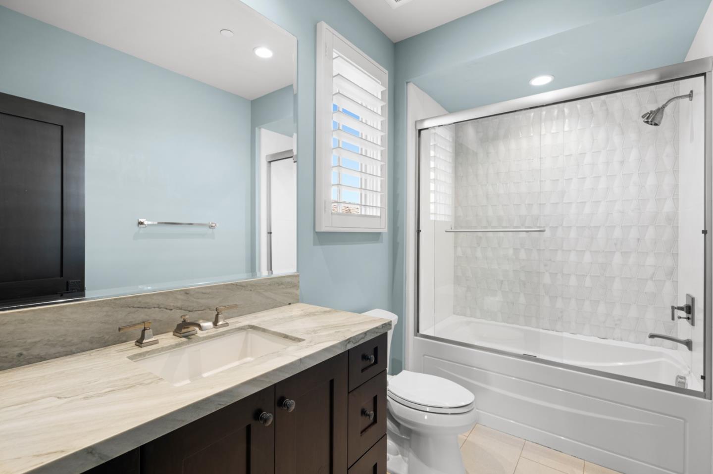 2 Water Port Newport Coast, CA 92657 - Photo 24 of 32 a bathroom with a granite countertop sink toilet and shower
