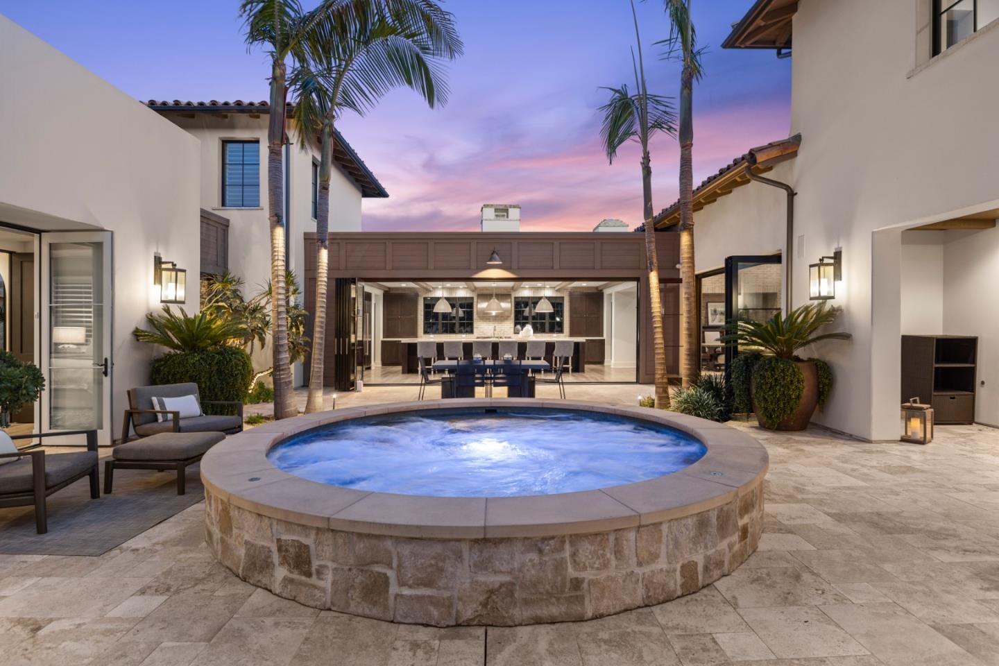2 Water Port Newport Coast, CA 92657 - Photo 29 of 32 a view of a house with a swimming pool and sitting area