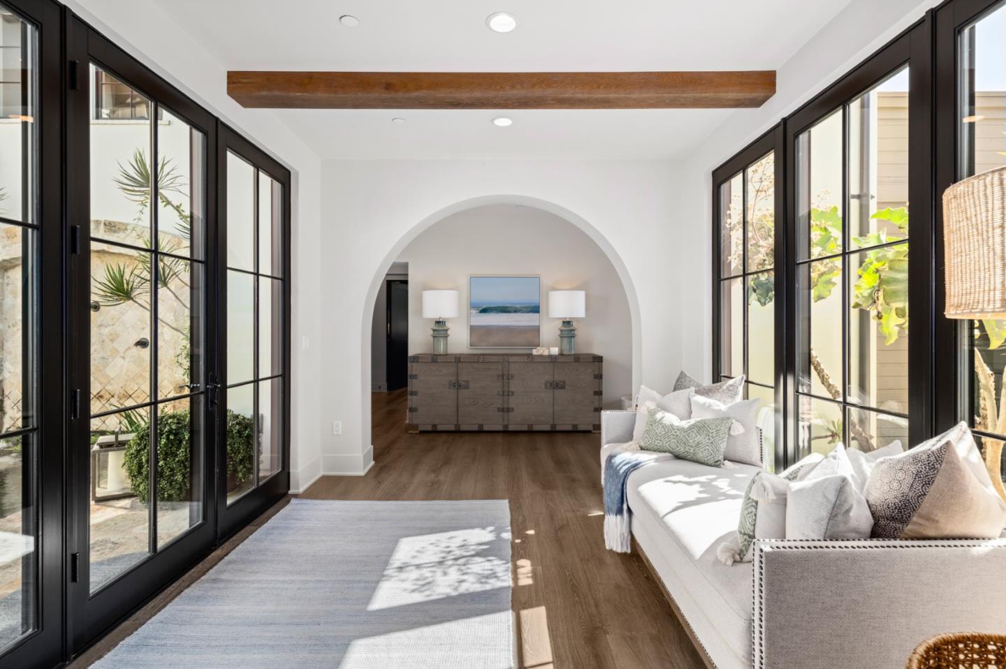 2 Water Port Newport Coast, CA 92657 - Photo 5 of 32 a living room with furniture and a floor to ceiling window