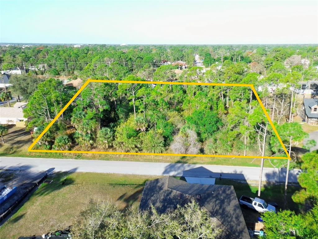 Killian St Port North Port, FL 34286 - Photo 2 of 7 a view of a yard with an outdoor space and seating area