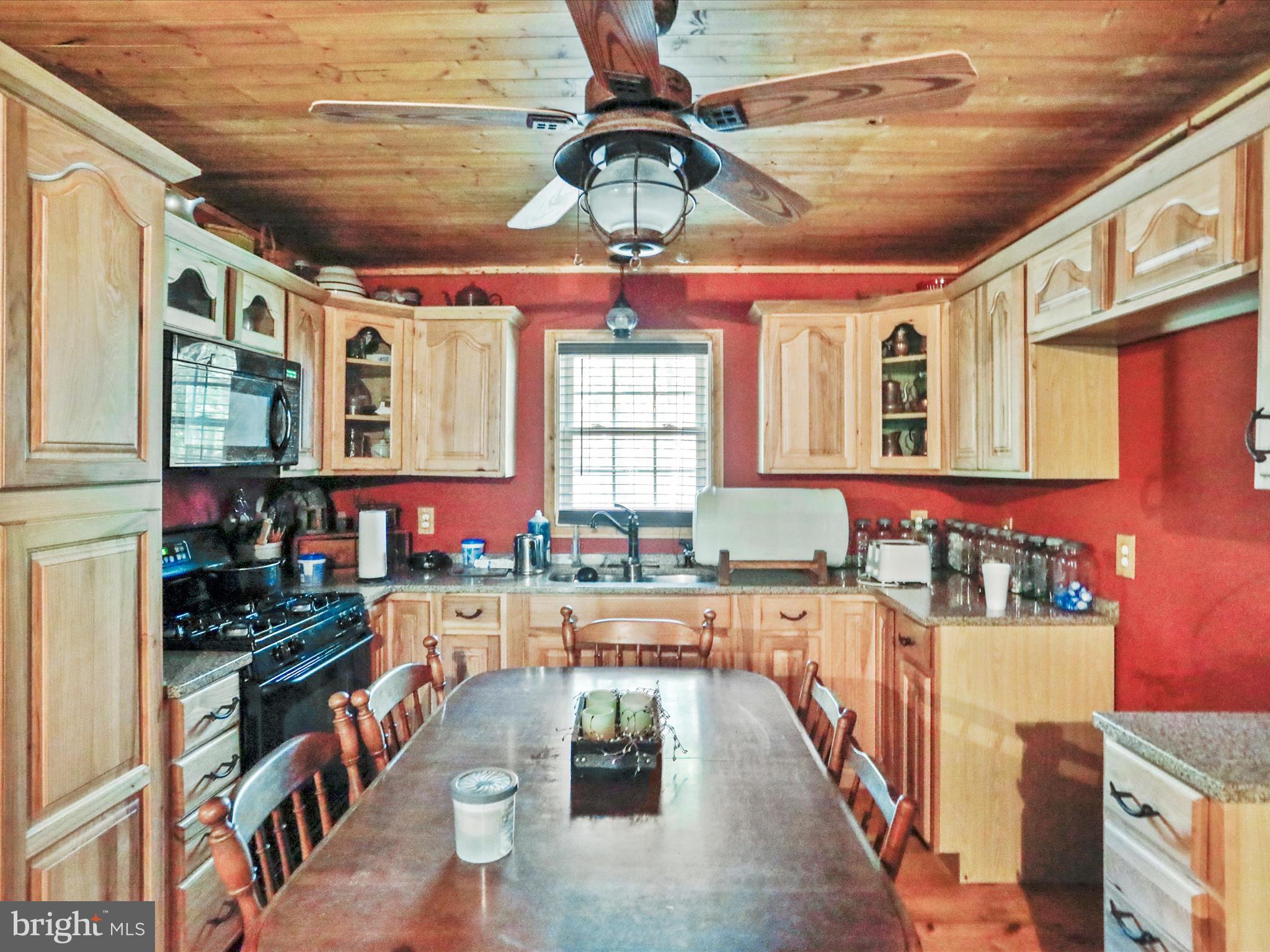 2180 Old Smith Farm Road Springfield, WV 26763 - Photo 16 of 24 a kitchen with lots of counter top space