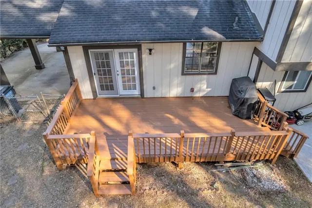 a view of a balcony with furniture