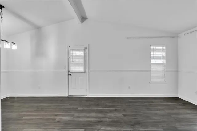 an empty room with window