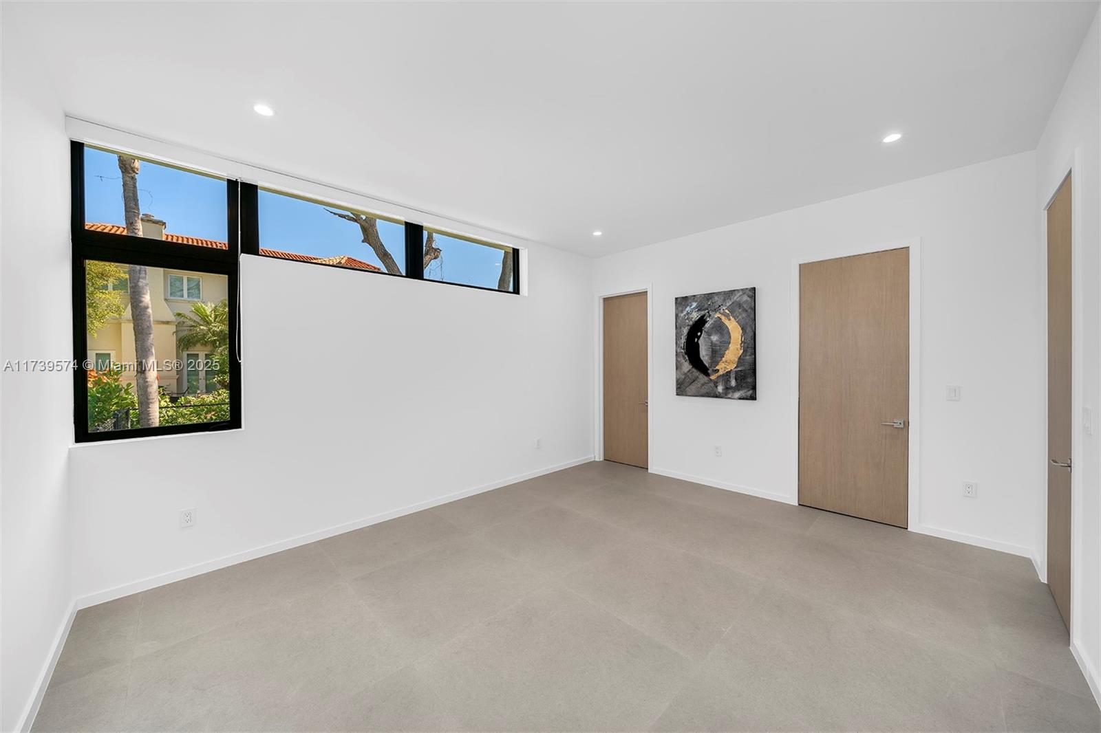 6830 Southwest 104th Street Pinecrest, FL 33156 - Photo 29 of 59 a view of an empty room with window