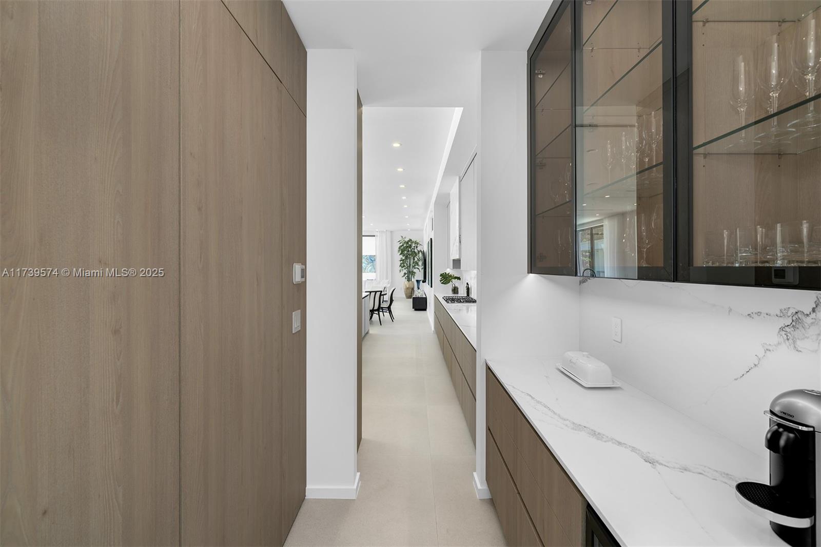 6830 Southwest 104th Street Pinecrest, FL 33156 - Photo 9 of 59 a en suite bathroom with a sink and a mirror