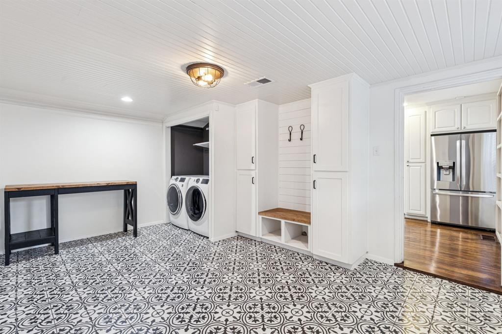 6342 Anita Street Dallas, TX 75214 - Photo 15 of 26 a bathroom with a sink and a mirror