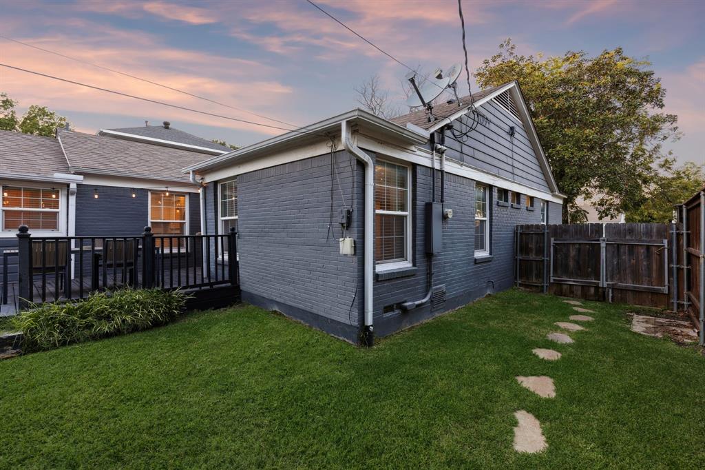 6342 Anita Street Dallas, TX 75214 - Photo 4 of 26 a view of a house with a yard and sitting area
