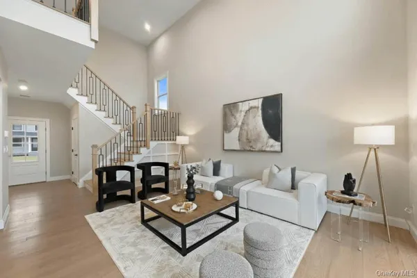 a living room with furniture and a table