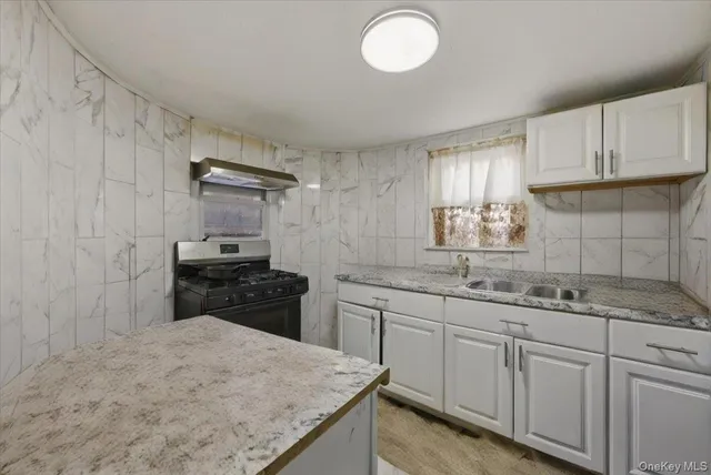 $1,150,000 | 139-72 86th Road | Briarwood