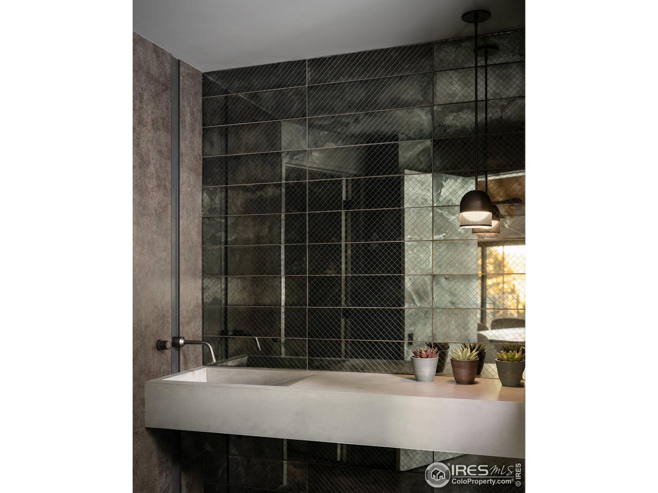 3500 Bison Drive Boulder, CO 80025 - Photo 18 of 37 a bathroom with a sink and a mirror