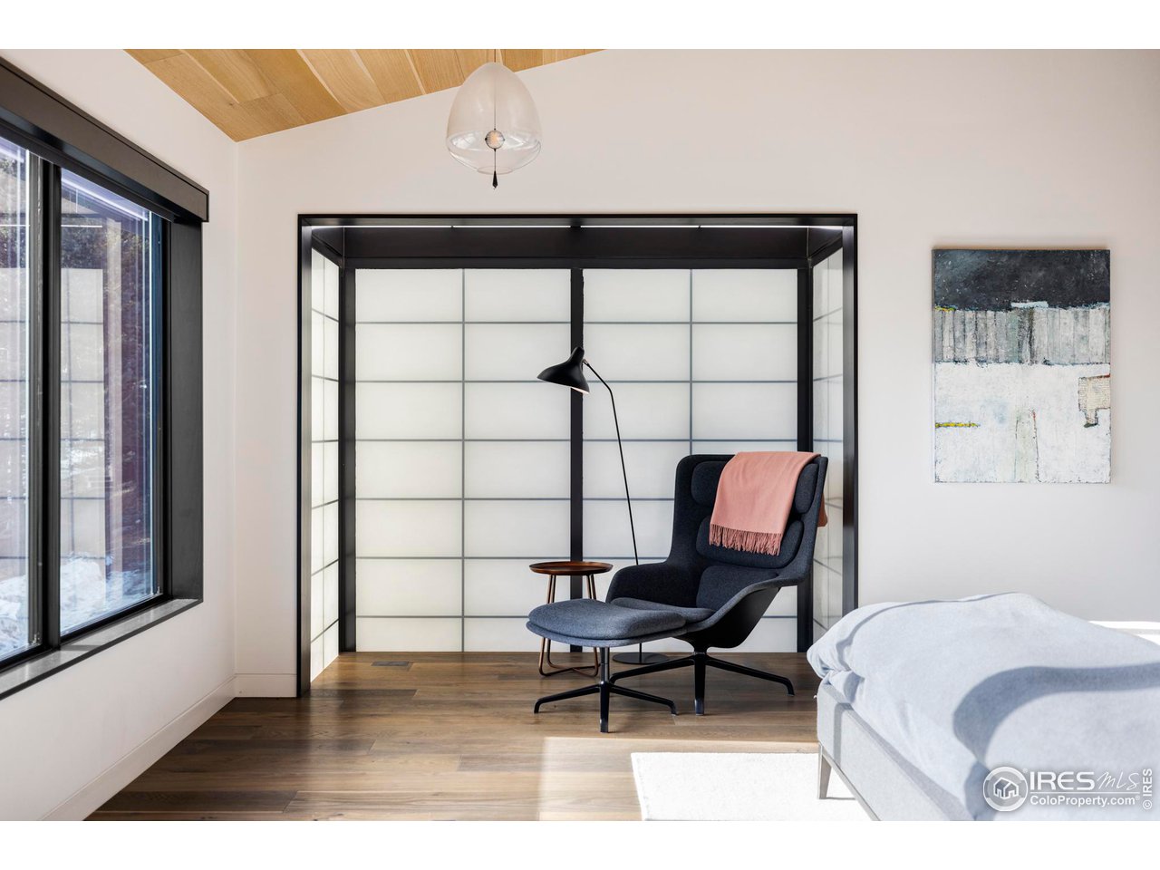 3500 Bison Drive Boulder, CO 80025 - Photo 21 of 37 a living room with a couch and a window