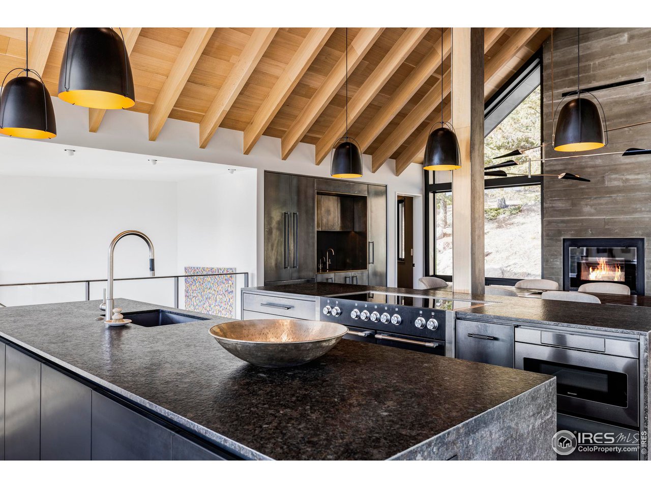 3500 Bison Drive Boulder, CO 80025 - Photo 8 of 37 a kitchen with a sink and a refrigerator