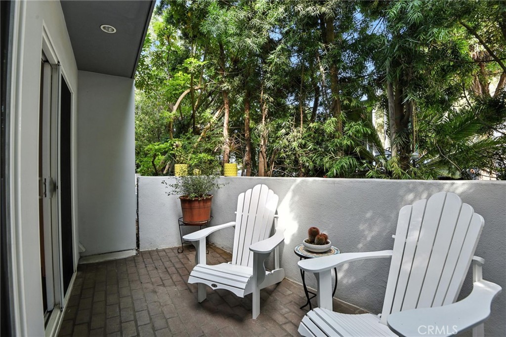 2203 3rd Street, Unit 1 Santa Monica, CA 90405 - Photo 11 of 46 a view of balcony with wooden floor and outdoor seating