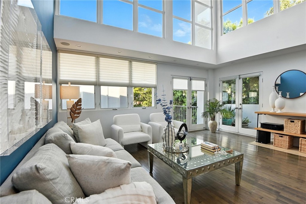 2203 3rd Street, Unit 1 Santa Monica, CA 90405 - Photo 3 of 46 a living room with fireplace furniture and a large window