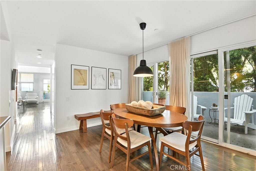 2203 3rd Street, Unit 1 Santa Monica, CA 90405 - Photo 10 of 46 a view of a dining room with furniture window and wooden floor
