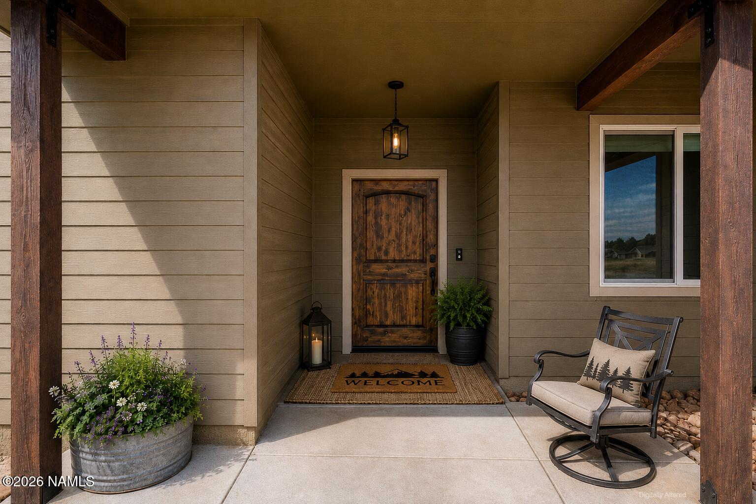 10272 Fw Mclure Road Flagstaff, AZ 86004 - Photo 13 of 38 a view of a entryway door of the house