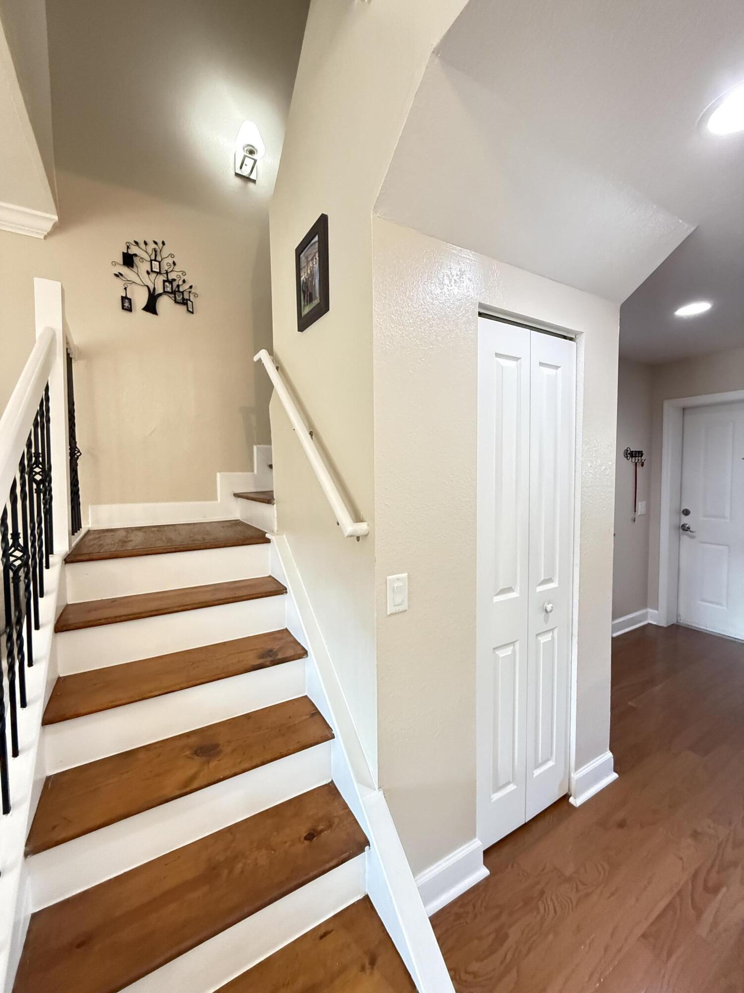 9745 Touchton Road, Unit 1726 Jacksonville, FL 32246 - Photo 13 of 40 a view of entryway with wooden floor and front door