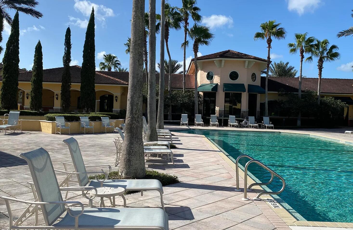 9745 Touchton Road, Unit 1726 Jacksonville, FL 32246 - Photo 32 of 40 a view of a building with a yard