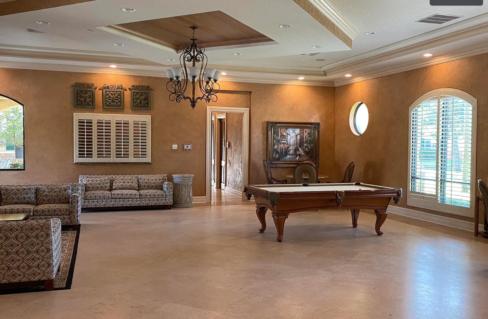 9745 Touchton Road, Unit 1726 Jacksonville, FL 32246 - Photo 36 of 40 a living room with furniture and a window