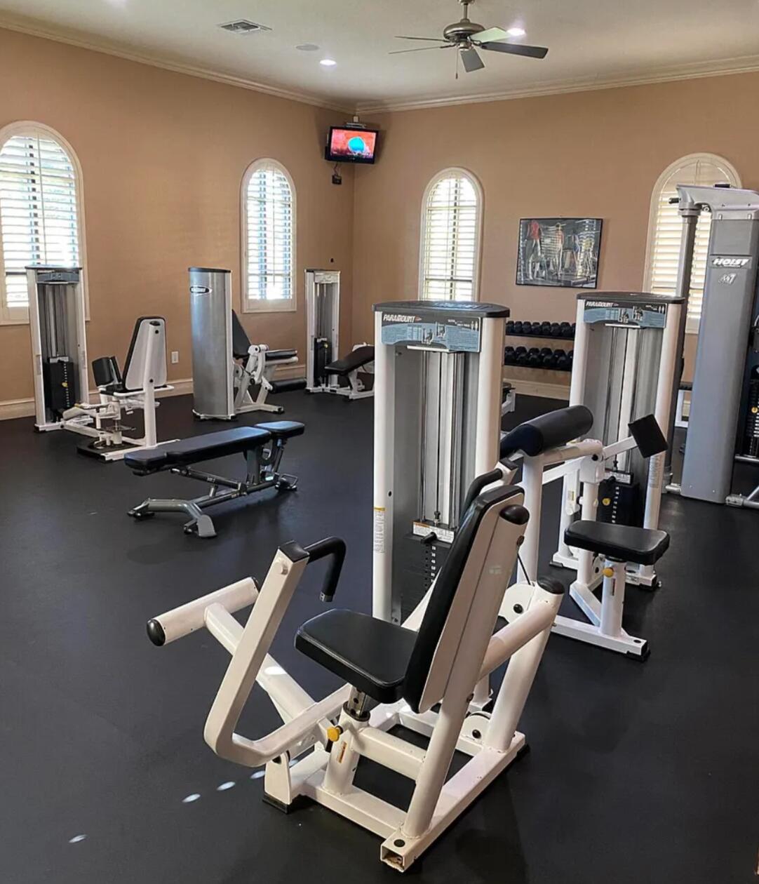 9745 Touchton Road, Unit 1726 Jacksonville, FL 32246 - Photo 37 of 40 a room with gym equipment and a large window