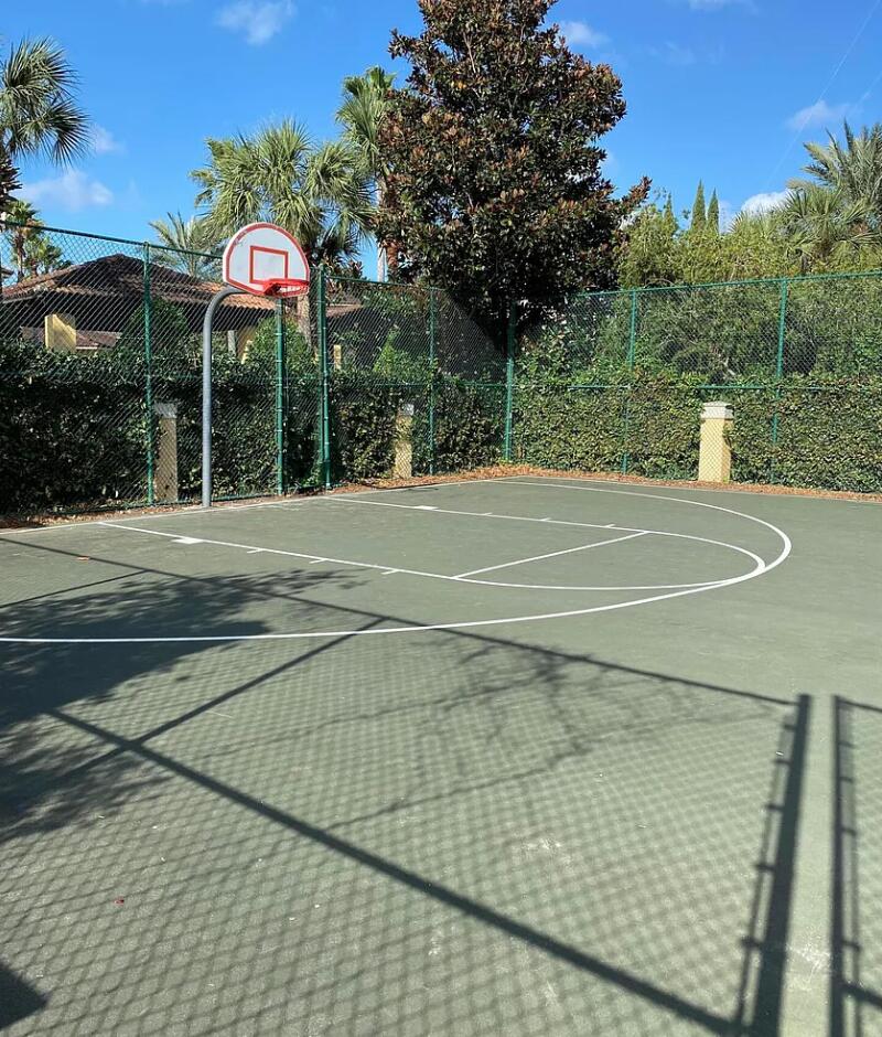 9745 Touchton Road, Unit 1726 Jacksonville, FL 32246 - Photo 38 of 40 a view of a tennis ground with large trees