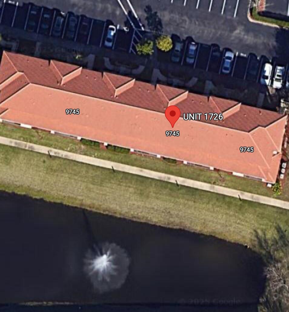 9745 Touchton Road, Unit 1726 Jacksonville, FL 32246 - Photo 39 of 40 a street view with an outdoor space