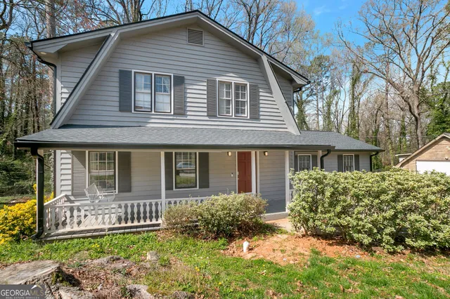 front view of a house with a yard