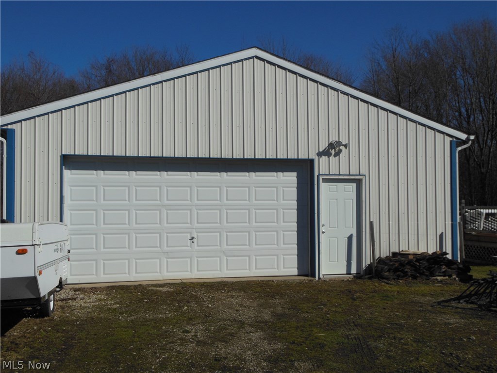 4679 Wood Road Madison, OH 44057 - Photo 3 of 23 30x40 Outbuilding, concrete floor, ceiling heater, and electric