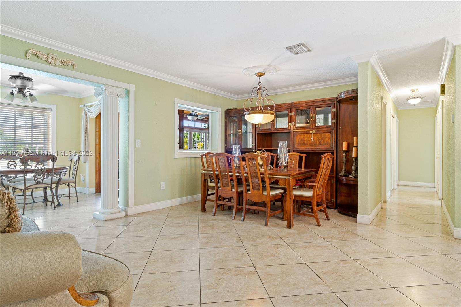 9901 Southwest 35th Terrace Miami, FL 33165 - Photo 12 of 50 a view of a dining room with furniture