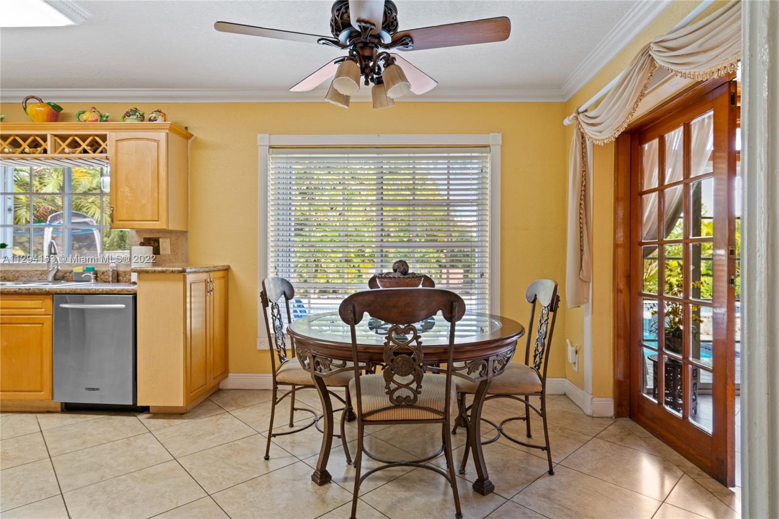 9901 Southwest 35th Terrace Miami, FL 33165 - Photo 29 of 50 a view of a dining room with furniture window and outside view