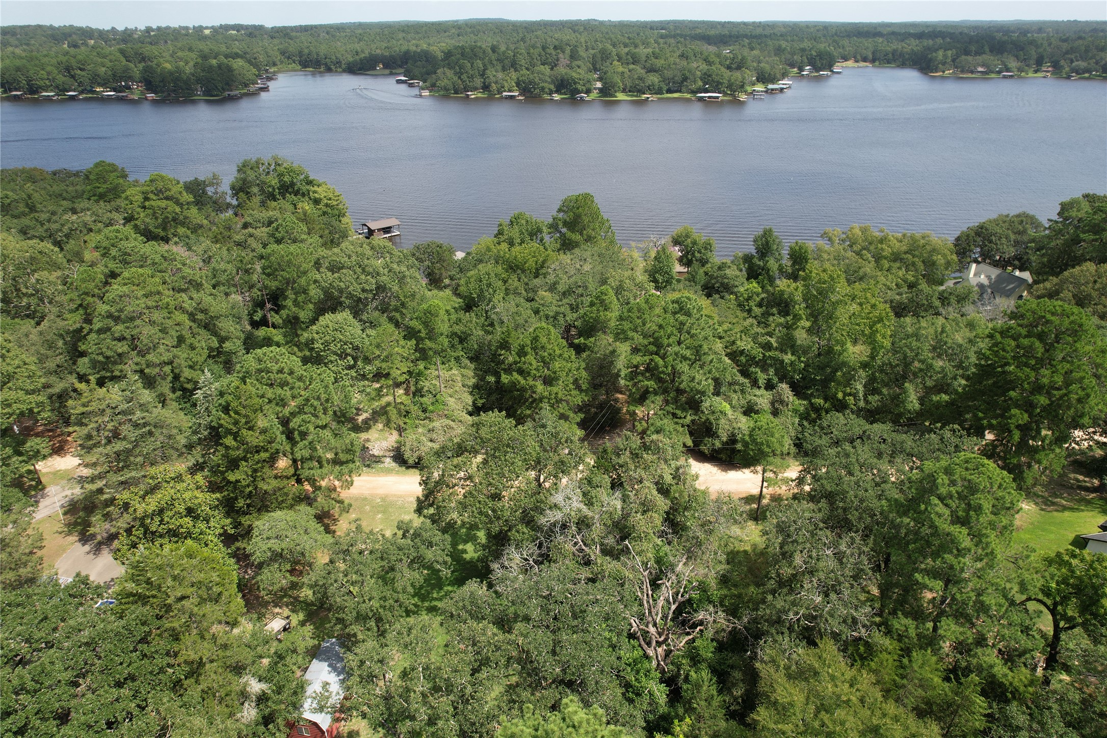 Tbd Tbd Dailey Road Crockett, TX 75835 - Photo 4 of 4 an aerial view of a residential houses with outdoor space and lake view