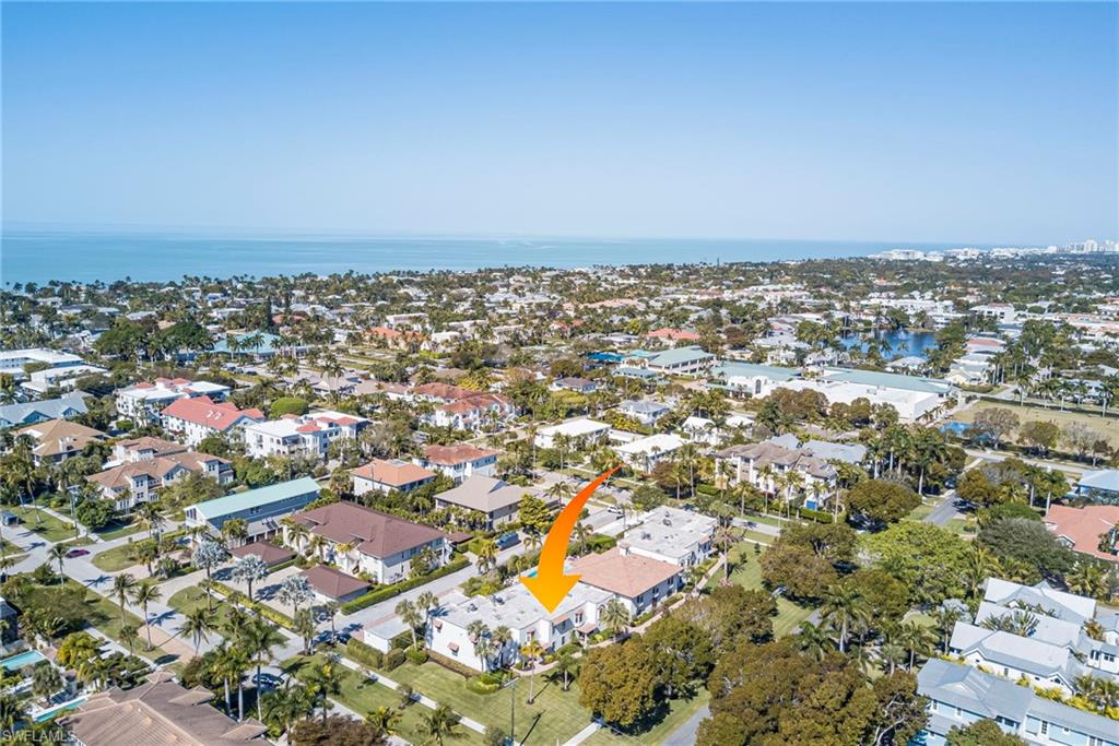 1070 6th Street South, Unit 1070 Naples, FL 34102 - Photo 1 of 41 Aerial view of property's location featuring nearby Cambier Park, beach access, 5th Ave, 3rd Ave...