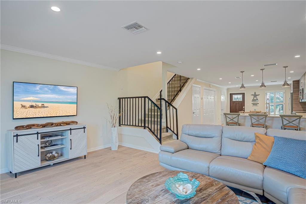 1070 6th Street South, Unit 1070 Naples, FL 34102 - Photo 19 of 41 Stairs to the upper level