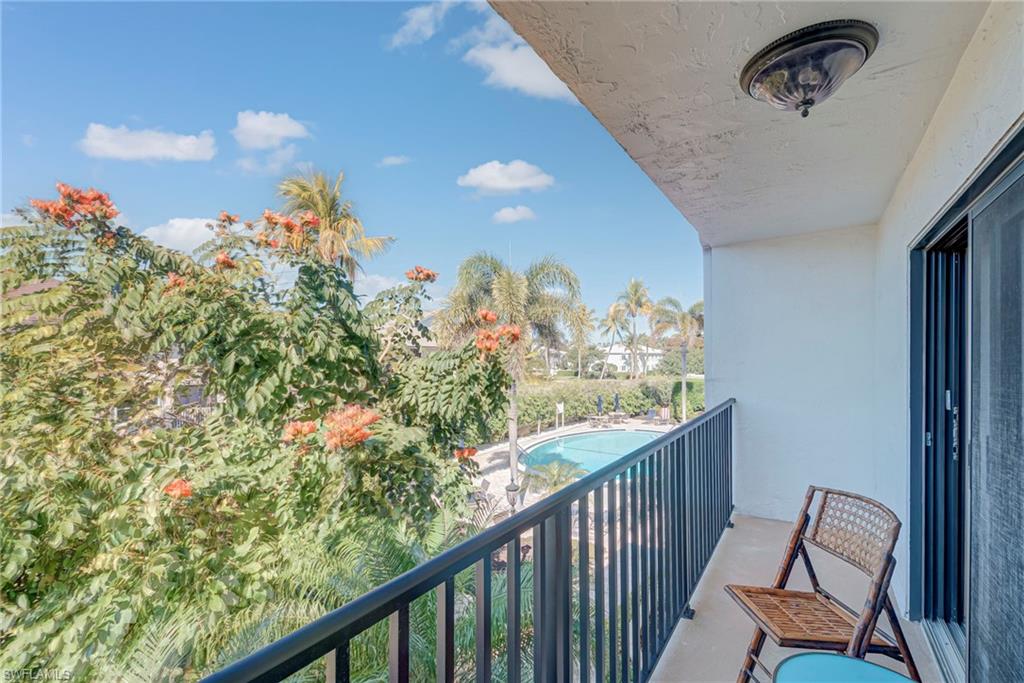 1070 6th Street South, Unit 1070 Naples, FL 34102 - Photo 38 of 41 Balcony with view of pool