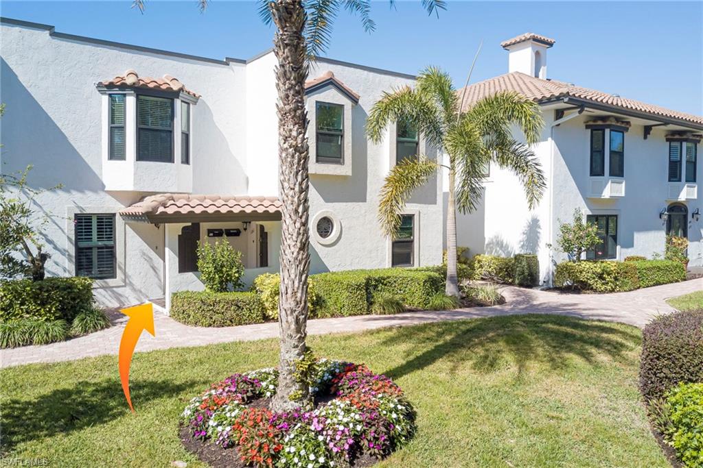 1070 6th Street South, Unit 1070 Naples, FL 34102 - Photo 4 of 41 Mediterranean / spanish-style home with a front lawn and stucco siding