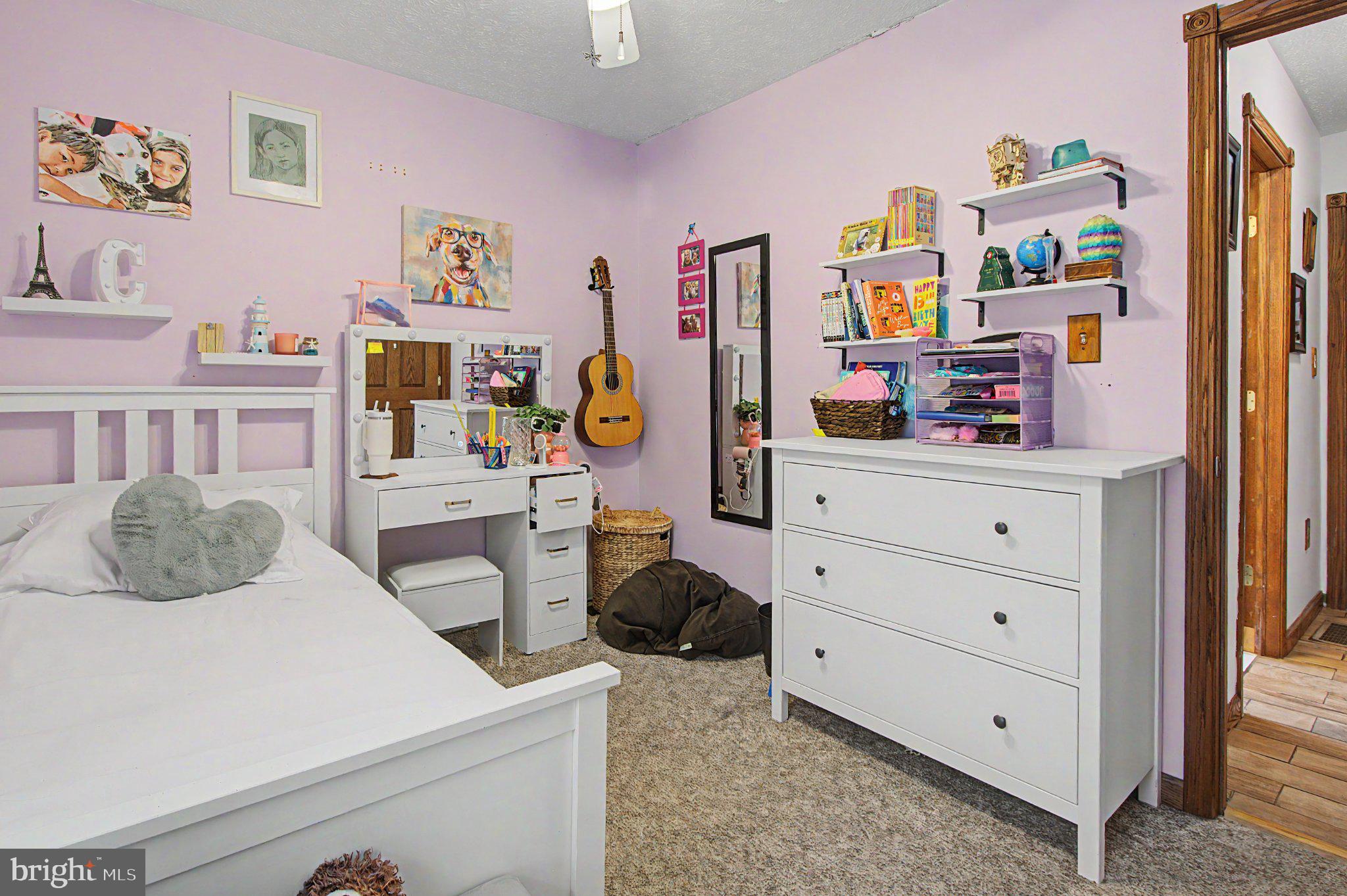 595 Pysell Crosscut Road Oakland, MD 21550 - Photo 28 of 61 Charming pastel-hued bedroom retreat.