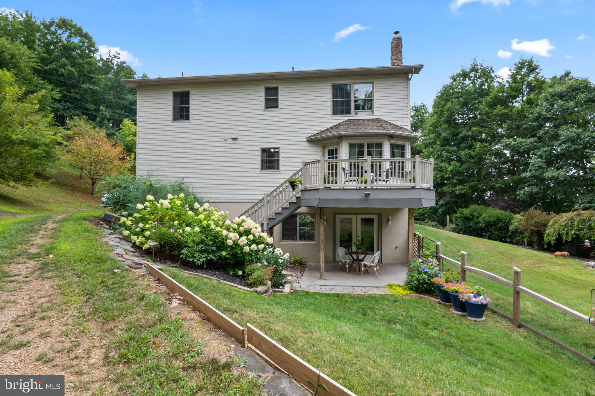 67 Louck Road Pine Grove, PA 17963 - Photo 6 of 48 Charming home with lush greenery.