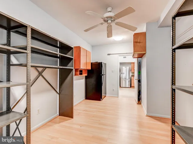 a bedroom with a bed and a table in it