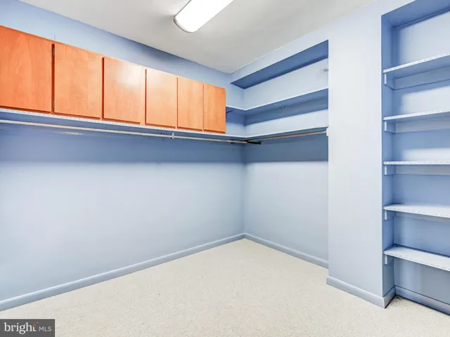 a view of a balcony with furniture