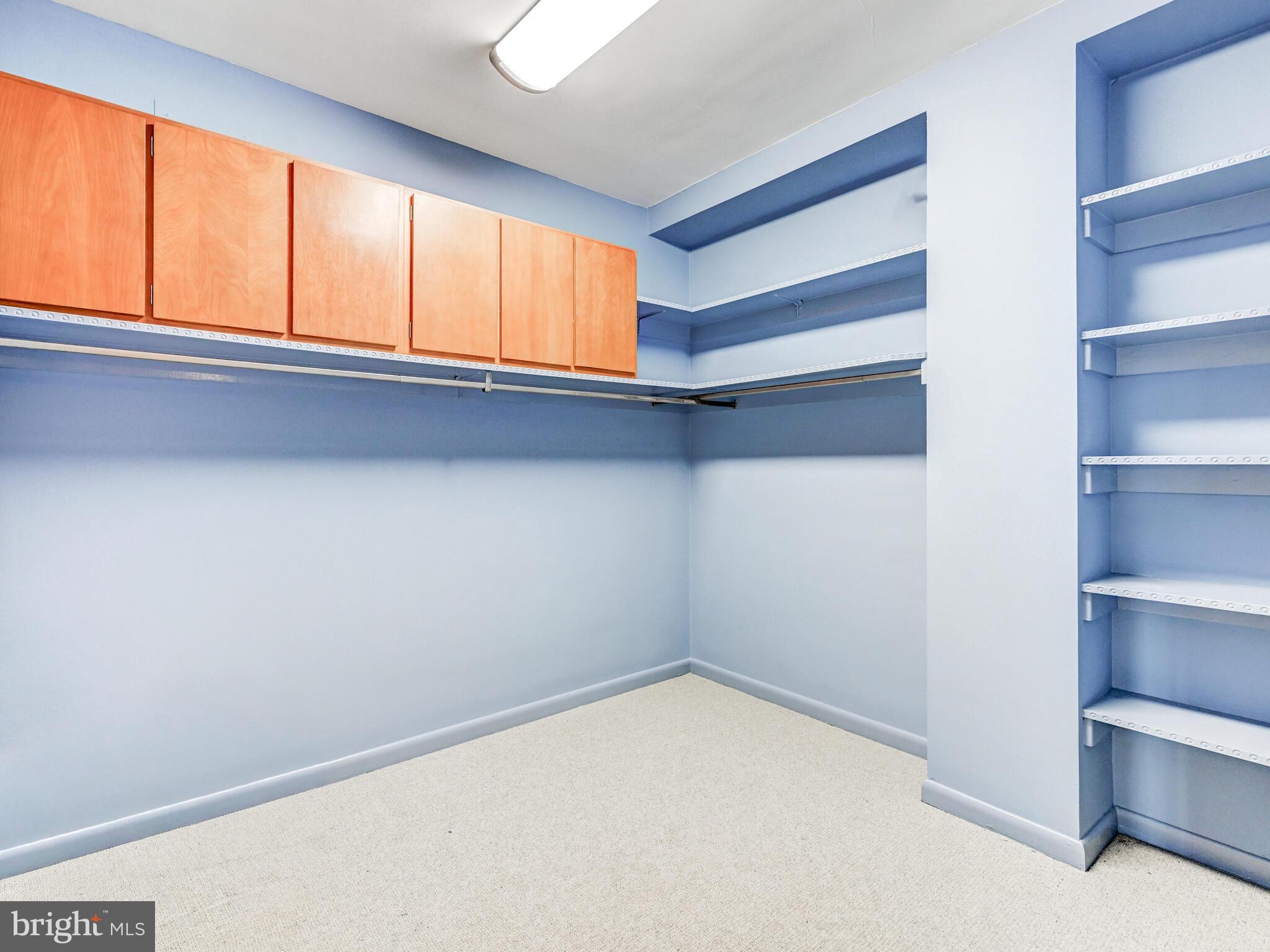 11 Slade Avenue, Unit 912 Baltimore, MD 21208 - Photo 27 of 31 a view of an empty room with a window