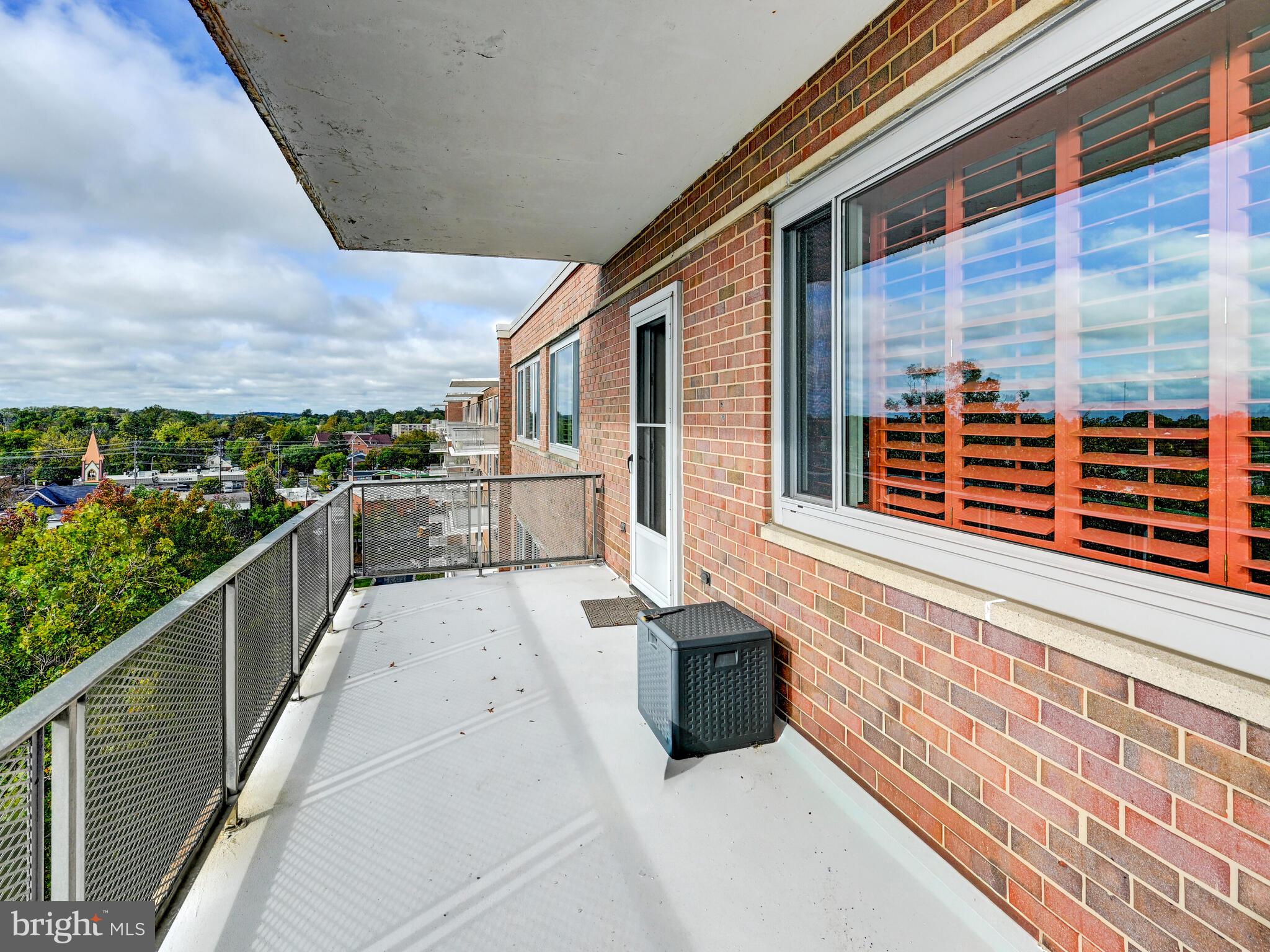 11 Slade Avenue, Unit 912 Baltimore, MD 21208 - Photo 28 of 31 a view of a balcony with furniture