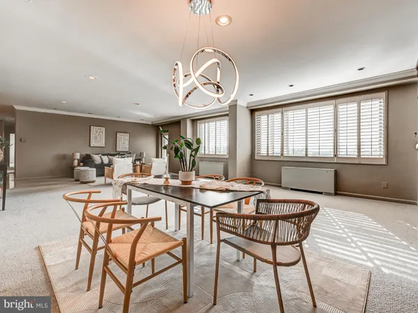 a view of a livingroom with furniture and wooden floor